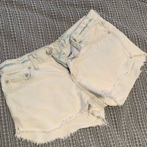 Free people acid wash distressed denim shorts